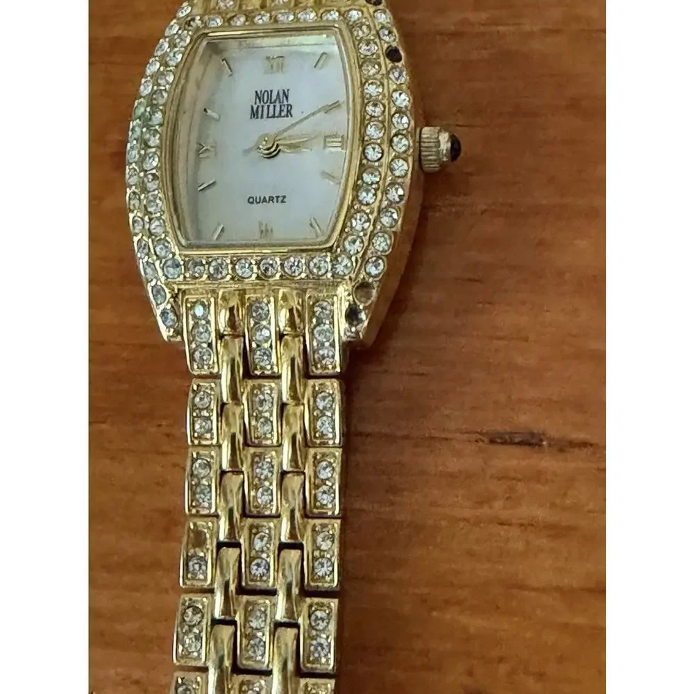 Nolan Miller Glamour Collection Crystal Gold Tone Bracelet Watch Mother Of Pearl